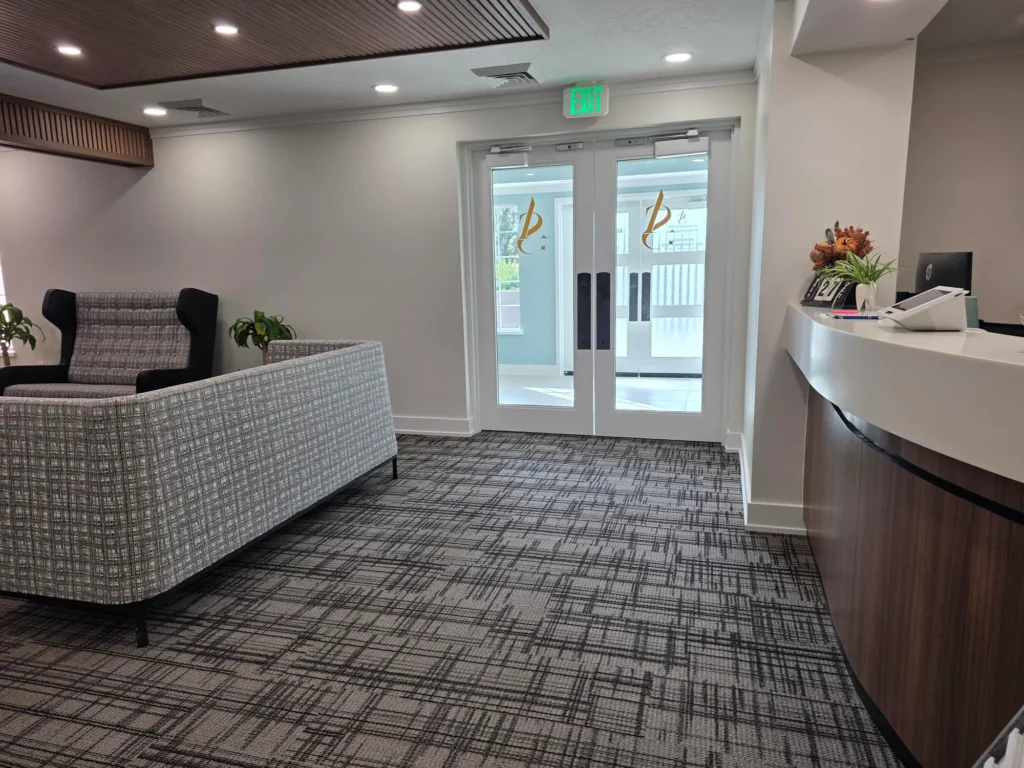 Waiting room seating near the entrance and front desk
