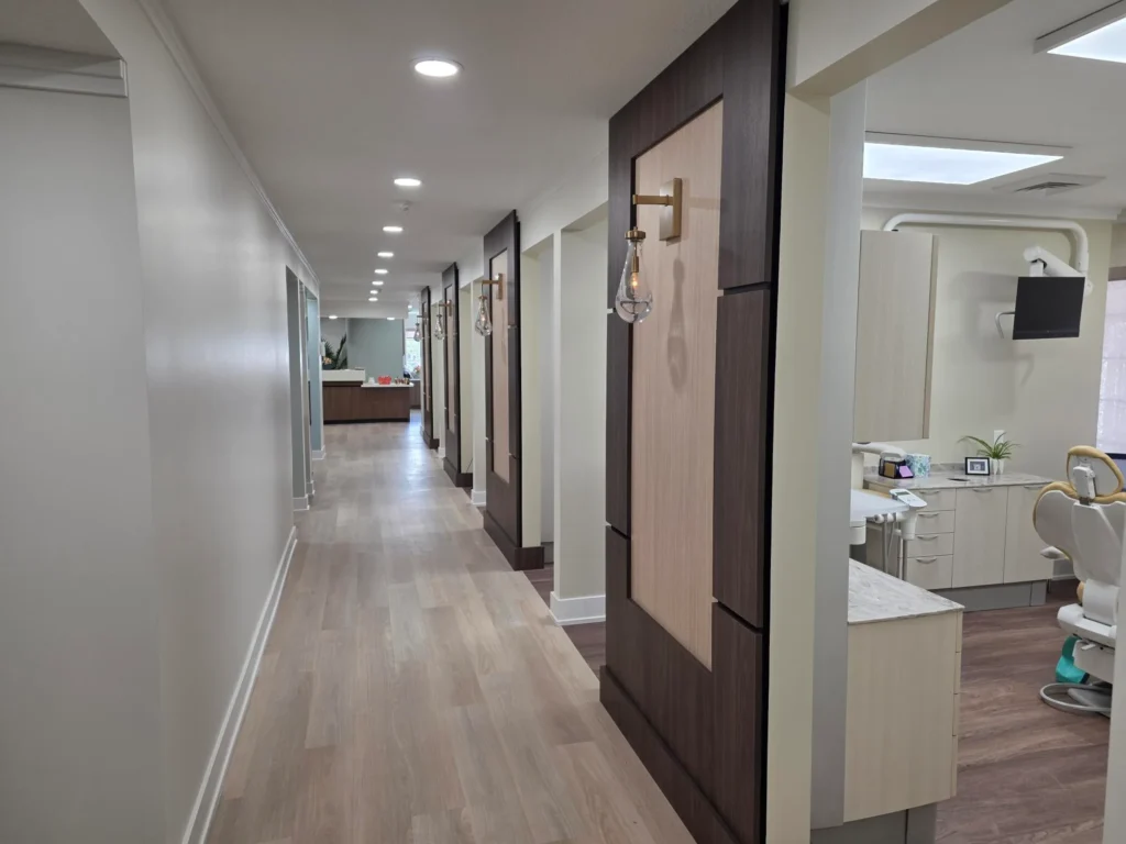 Long hallway lined with treatment rooms