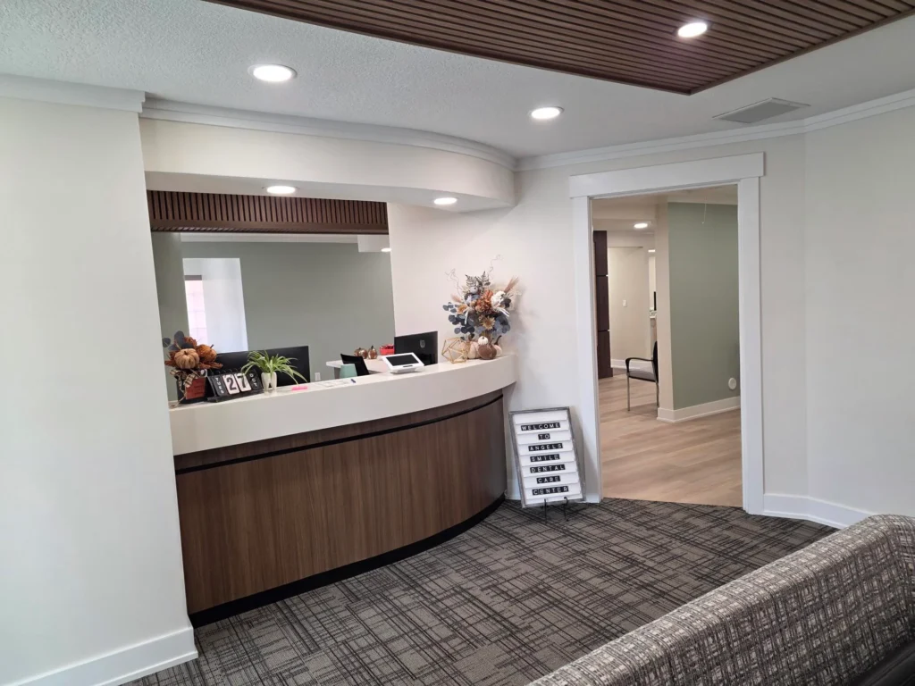 Curved front desk beside the waiting room